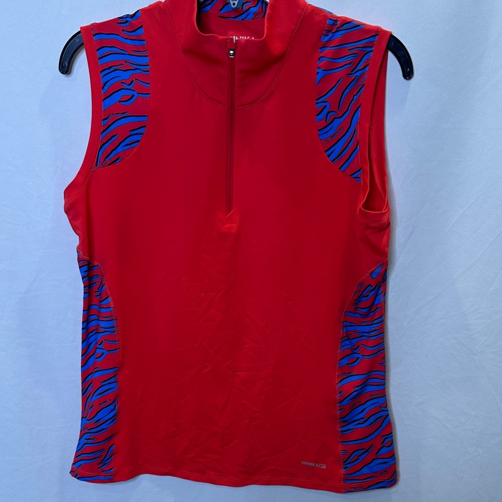 Annika/Cutter & Buck sleeveless golf shirt with zipper in front.  Sz M.  EUC